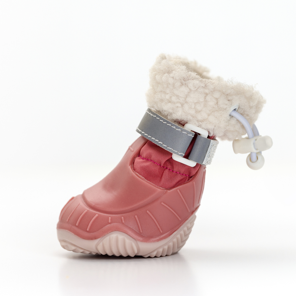 Pink dog snow boot with sherpa cuff, hook strap, and light tread sole