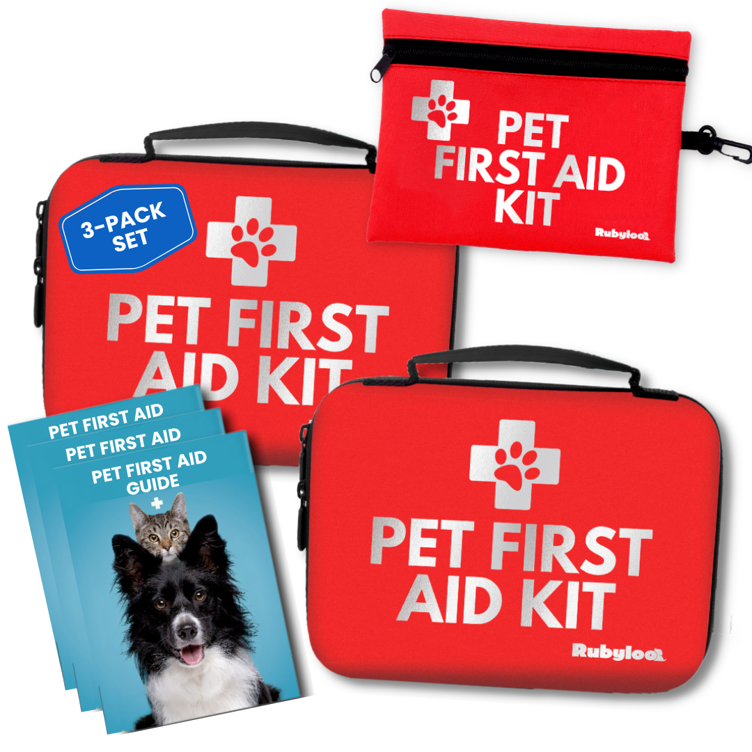 Two red pet first aid kit cases with handles and zipper, plus guide booklets in a set