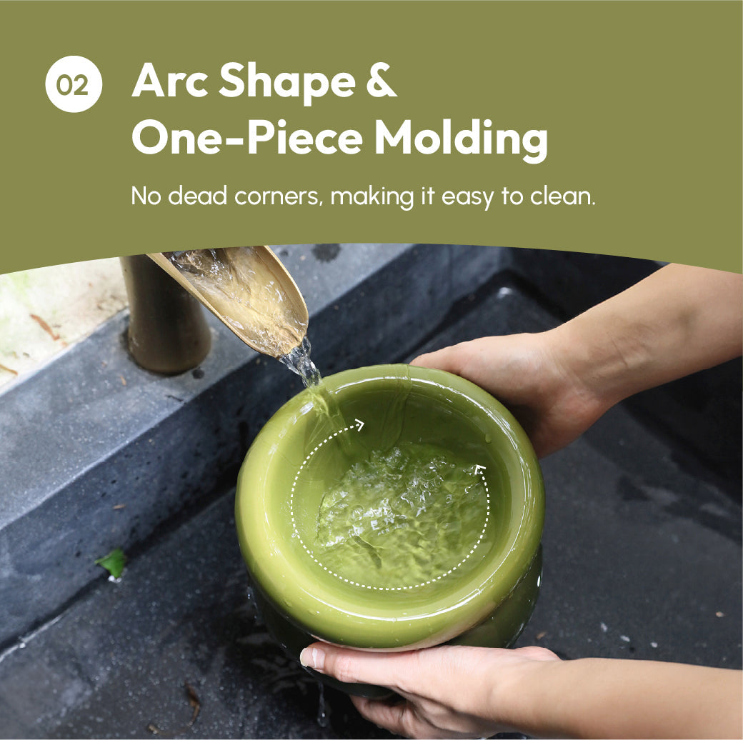 Avocado green soufflé-style pet bowl held under a stream of water