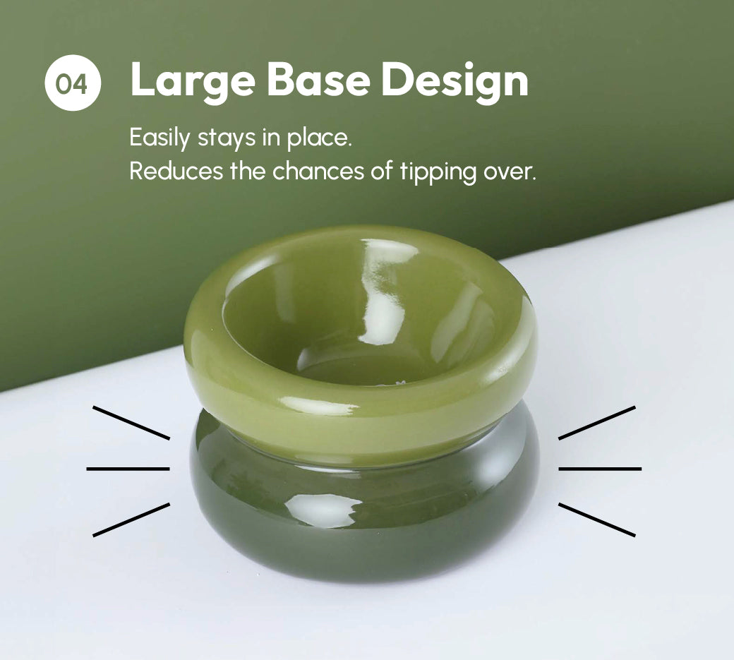 Avocado green soufflé pet bowl with raised non-slip base, glossy double dish
