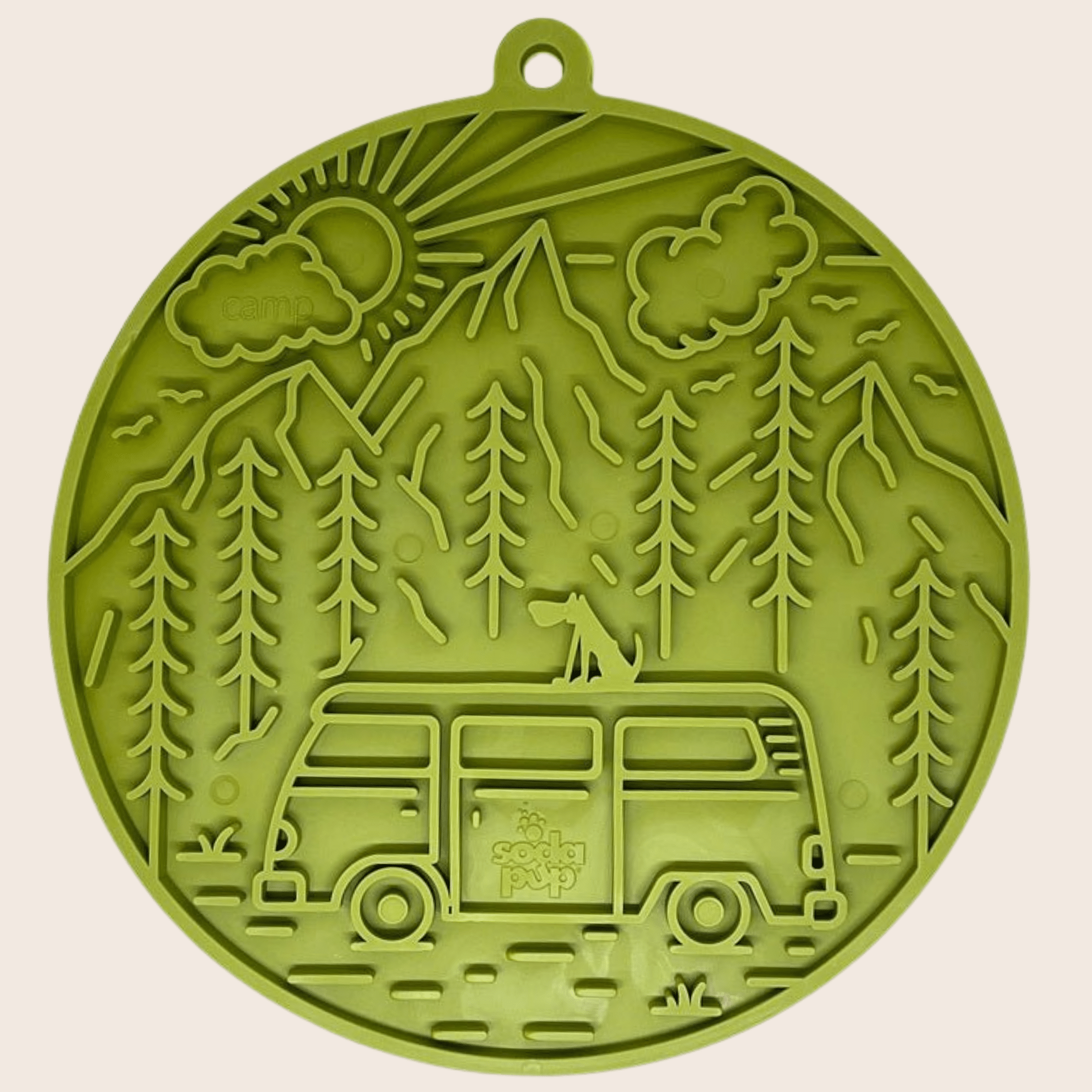 Green round dog lick mat with embossed forest scene texture and hanging loop.