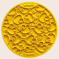 Yellow circular dog lick mat with raised chew pattern and suction cup bumps
