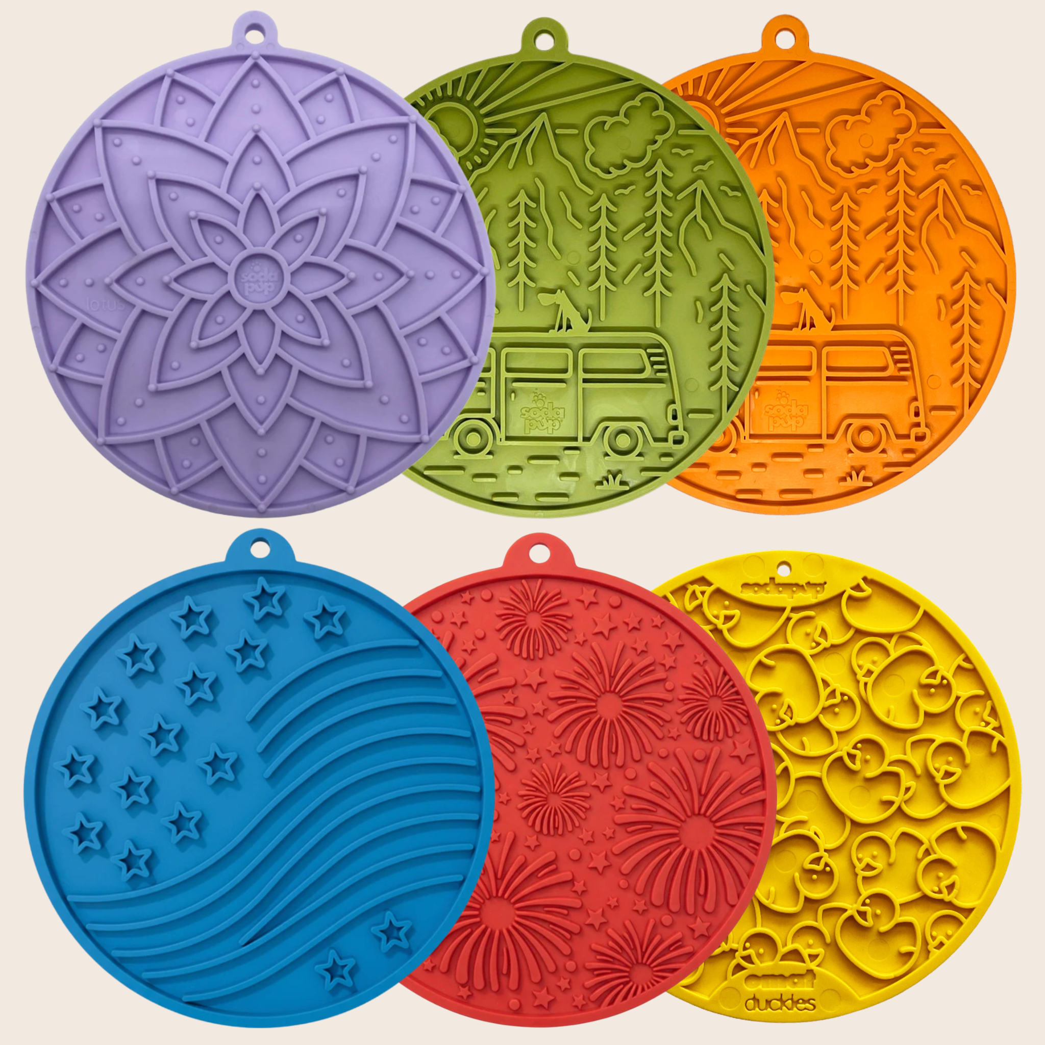 Assorted circular dog lick mats with suction cups in purple, green, orange, blue, red, yellow