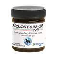 Colostrum supplement jar with dark ribbed lid and front label