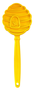 Yellow hand-held lick stick with raised honeycomb texture on a round head
