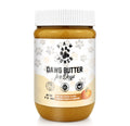 Pumpkin-flavored dog peanut butter jar with white ribbed lid, Dawg Butter label