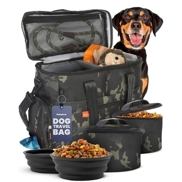Dog travel bag with zip top and mesh compartment, camouflage fabric with side pockets.