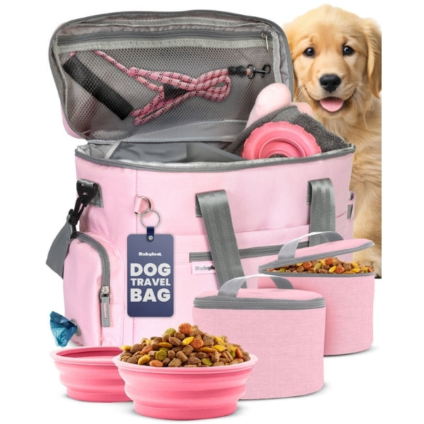 Pink dog travel bag with mesh divider and food bowls, plus water container pockets
