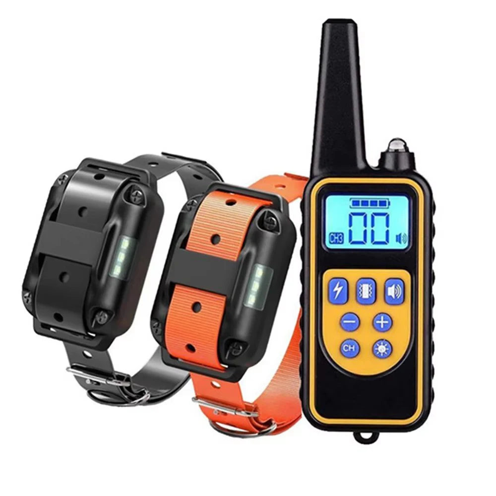 Dog training remote with orange and black receiver collars, each with electrode pads