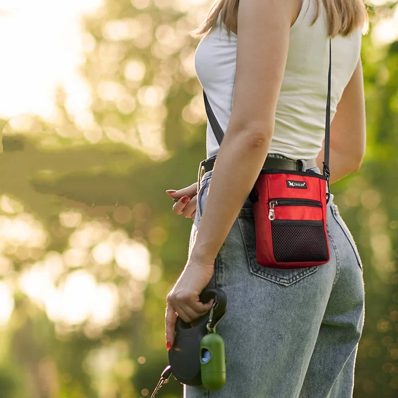 Red waist treat pouch bag with front mesh pocket, worn at hip with adjustable strap