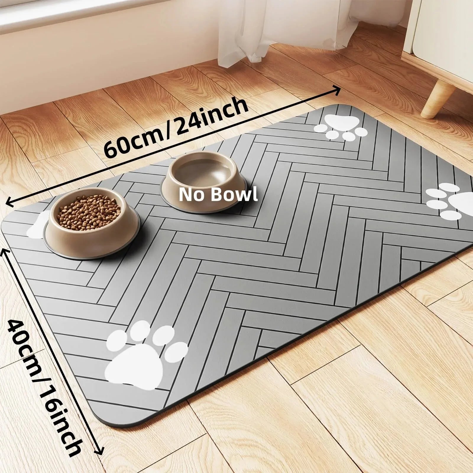Large rectangular dark grey pet feeding mat with white paw prints and two bowls placed on floor