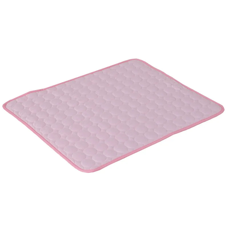 Pink dog cooling mat with raised bubble texture and thin pink border