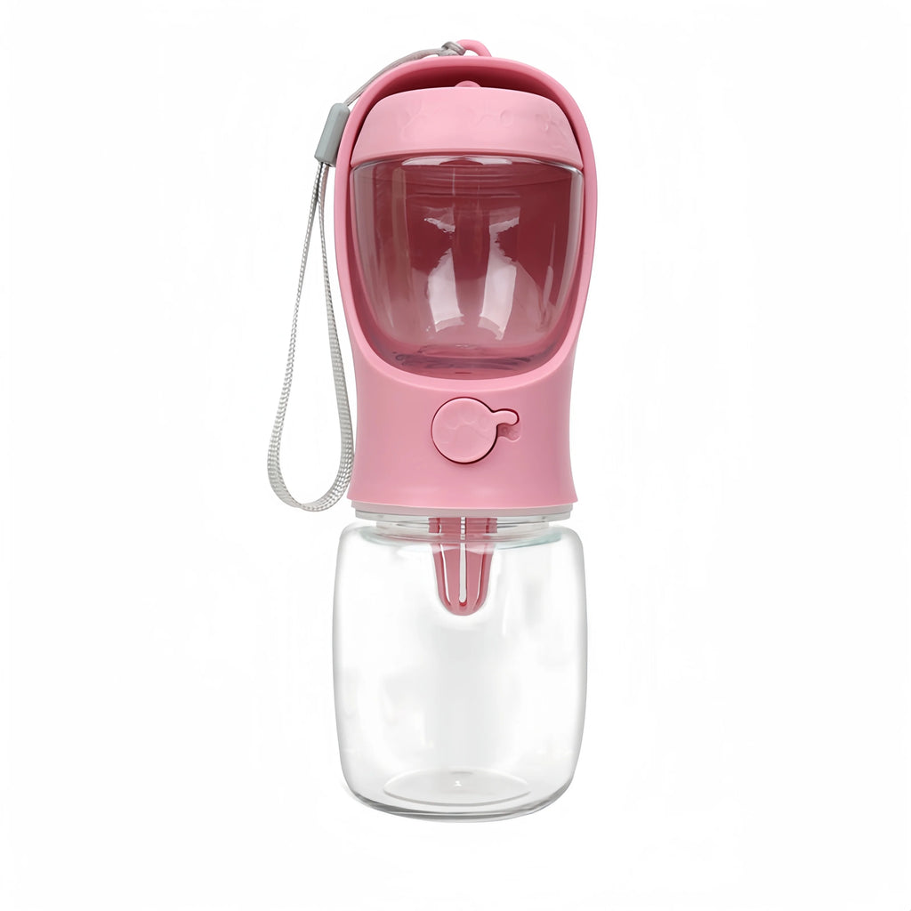 Portable pet water and food bottle in pink with clear base and bone-shaped front button