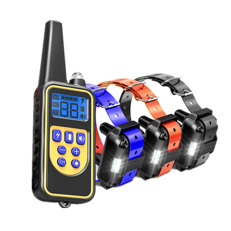 Dog training remote with blue, orange, and black receiver collars with electrode modules