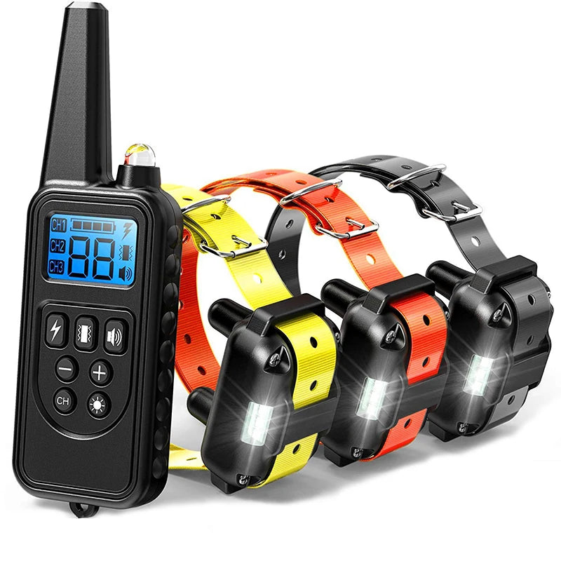 Dog training remote with multiple receiver collars in yellow, orange, red, and black