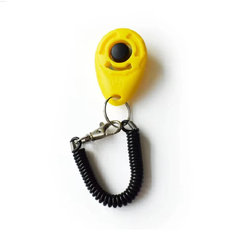 Yellow teardrop dog training clicker with black coiled wrist strap and metal key ring