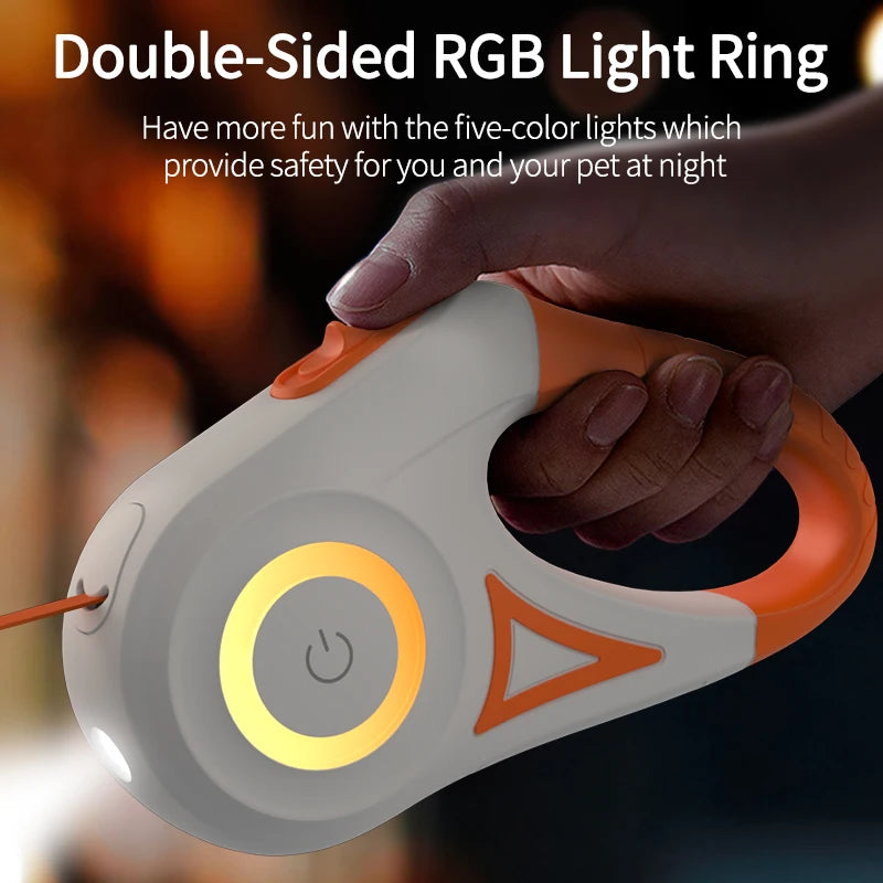 Retractable dog leash with glowing yellow LED light ring and orange side button