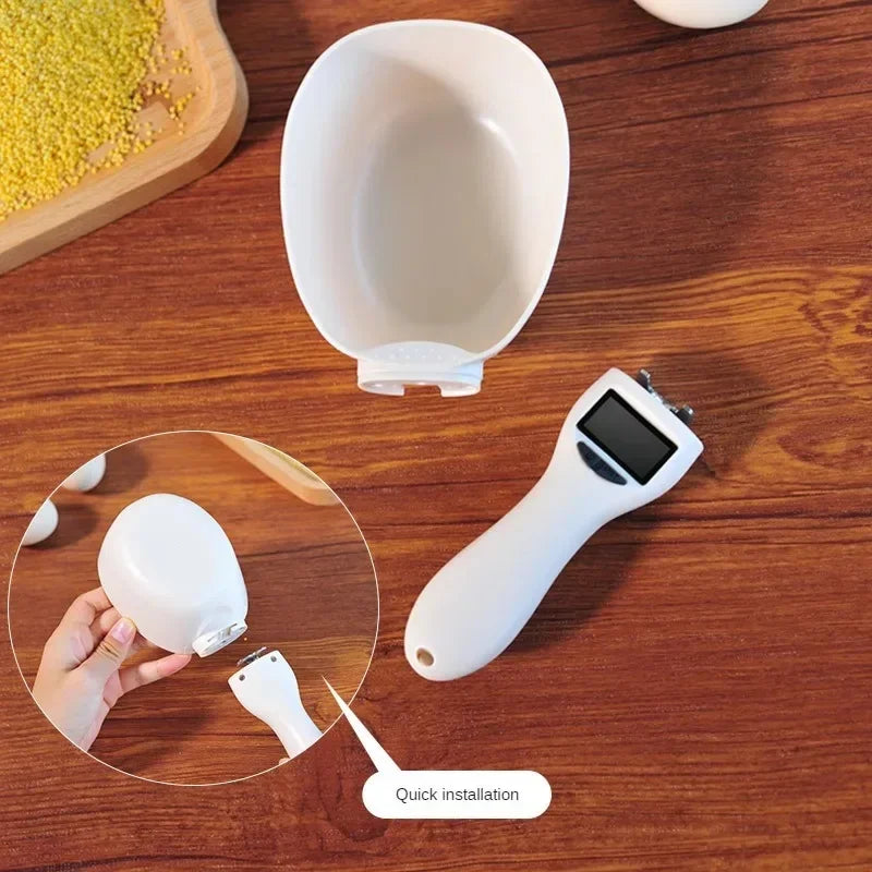 White electronic pet food measuring scoop with LCD screen, bowl filled with dry food