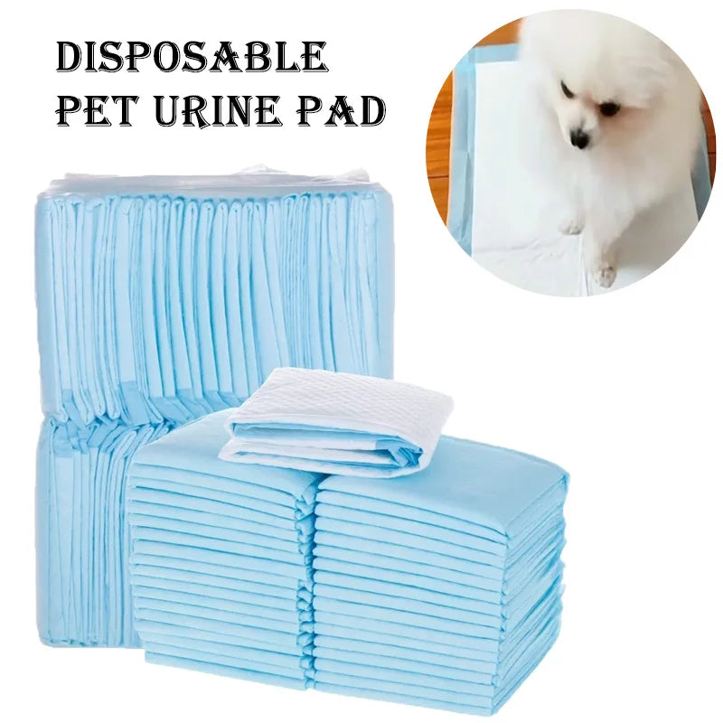 Disposable pet urine pads in light blue, stacked with a folded pad on top