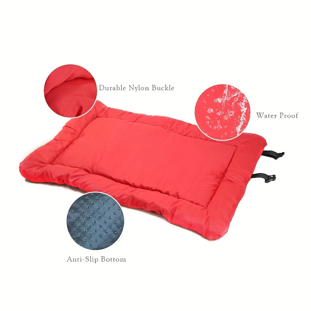 Red pet bed cushion with carry handle straps and anti-slip textured bottom