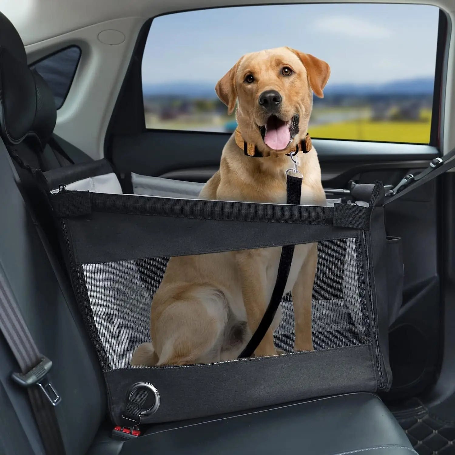 Black waterproof pet car seat with mesh front, shown with a dog inside
