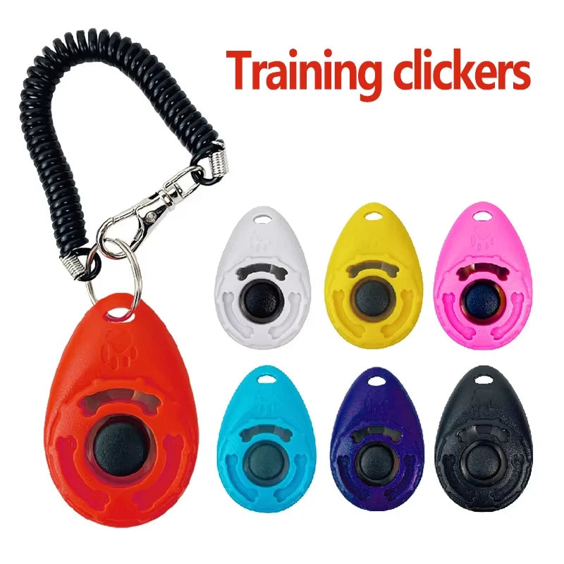 Assorted teardrop dog training clickers with colored bodies and black coiled keychain straps