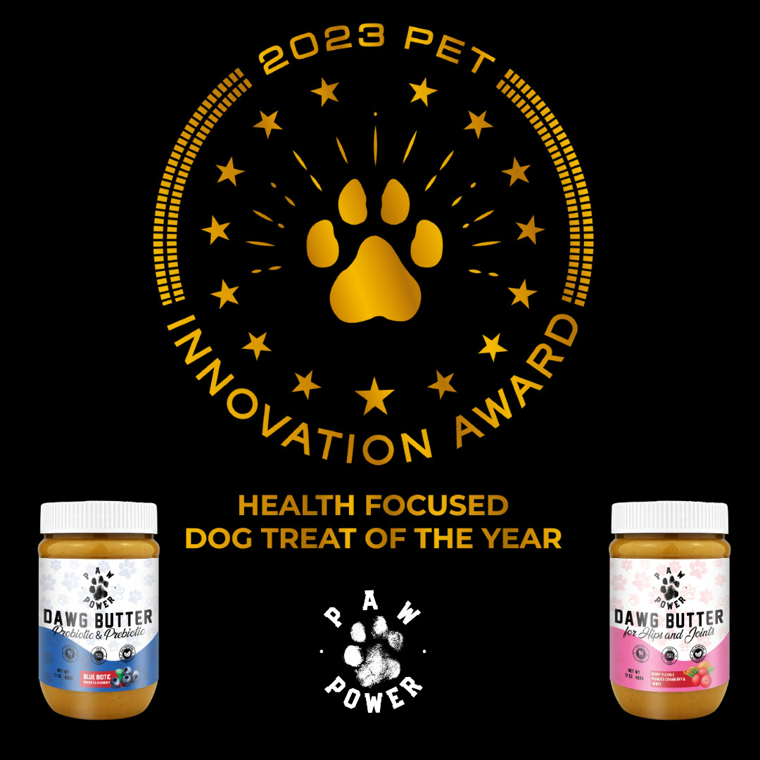 Dog treat jar with white cap and pink label, with gold paw award badge in view