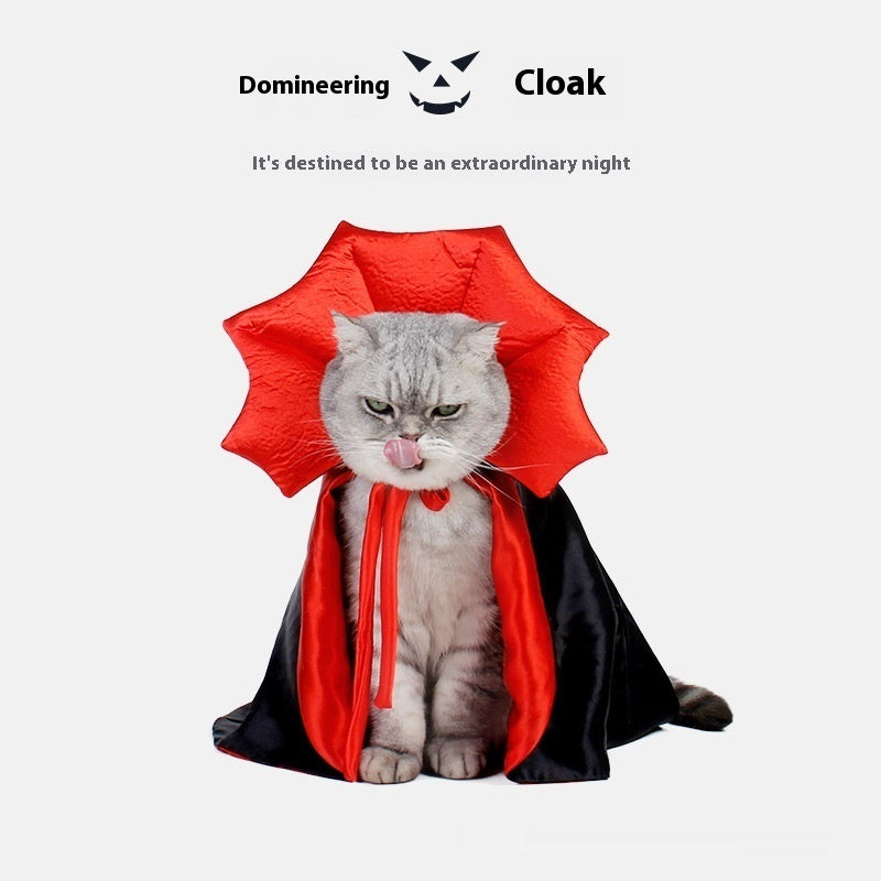 Red and black vampire pet cloak with star hood, tied ribbons, and black cape on cat