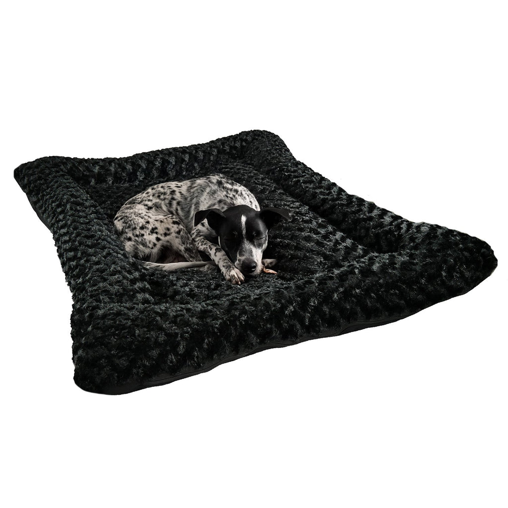 Black rectangular dog bed with bolstered edges, cloud-like faux fur top with resting dog