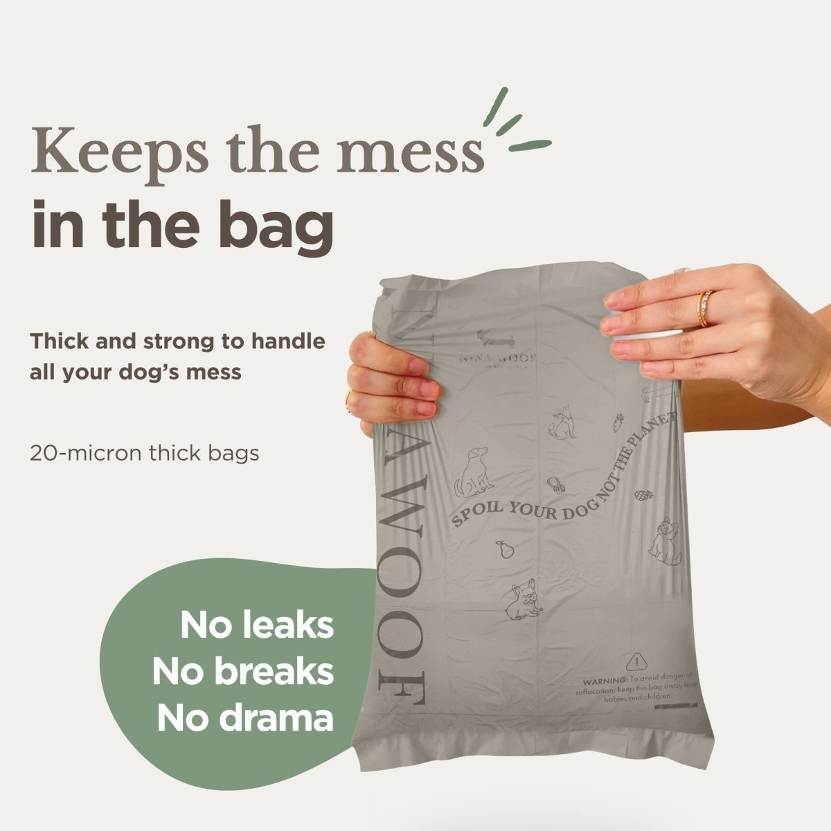 Thick biodegradable dog waste bag held upright; designed to prevent leaks.