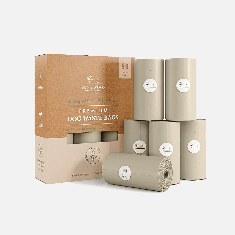 Biodegradable dog waste bags: kraft box with grey rolls and a bag roll in front.